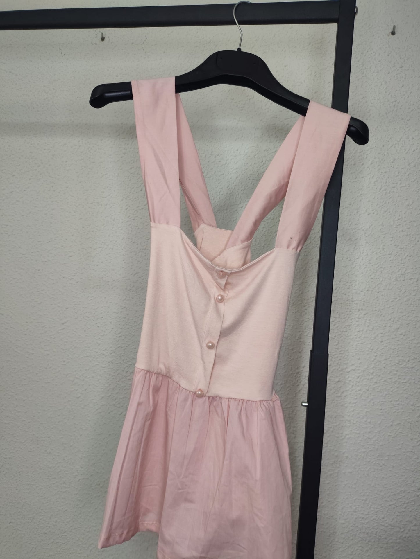 Top Perla Peplum rosa - vista en percha