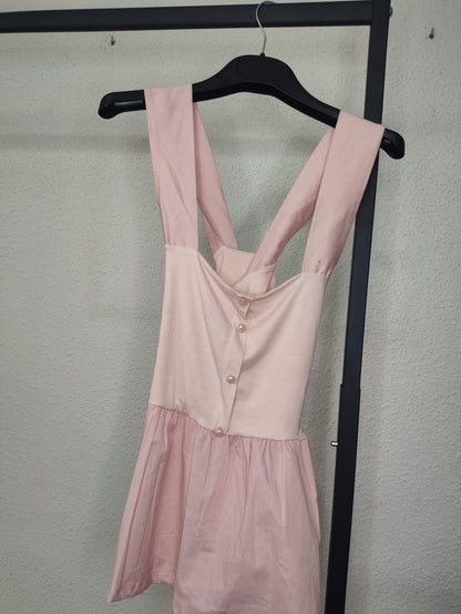 Top Perla Peplum rosa - vista en percha